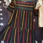 Peasant dress, V-neck, wide elbow length sleeves, calf-length bottom flounce