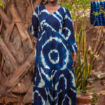 Long V-neck flared dress with long sleeves, overlapping panel