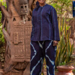 Gently fitted buttoned jacket with Chinese collar, long sleeves  Long pants elastic waist